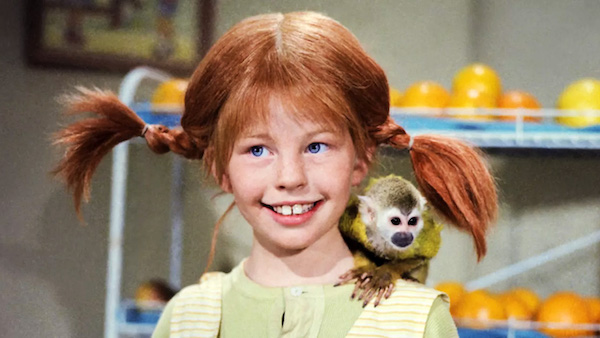 Pippi Langstrumpf mit Äffchen auf der Schulter